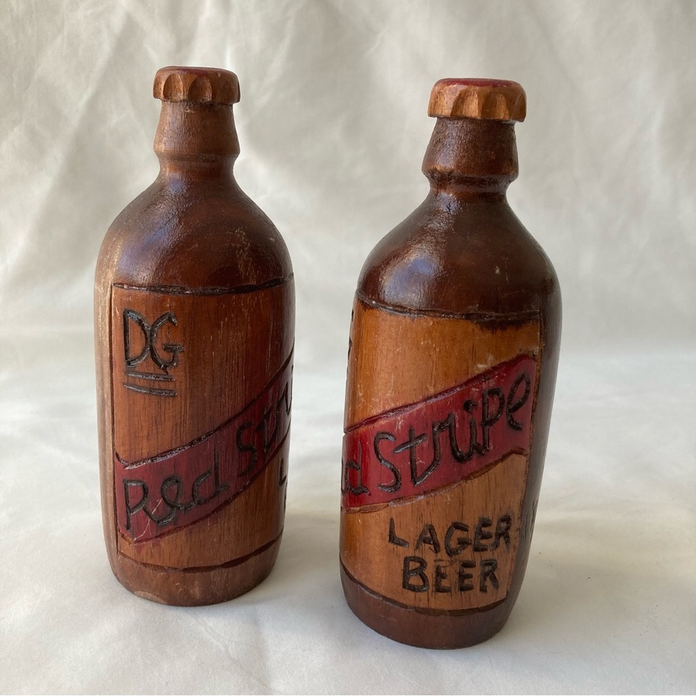Vintage Folk Art Wood Carving Sculpture Red Stripe Beer Advert Ephemera Set of 2